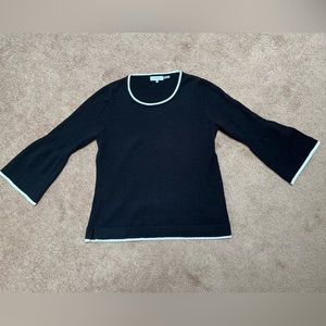 Calvin Klein size large black sweater with white trim